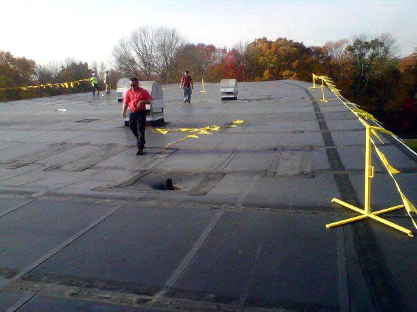 CDA Roofing crew at work on a commercial roofing project
